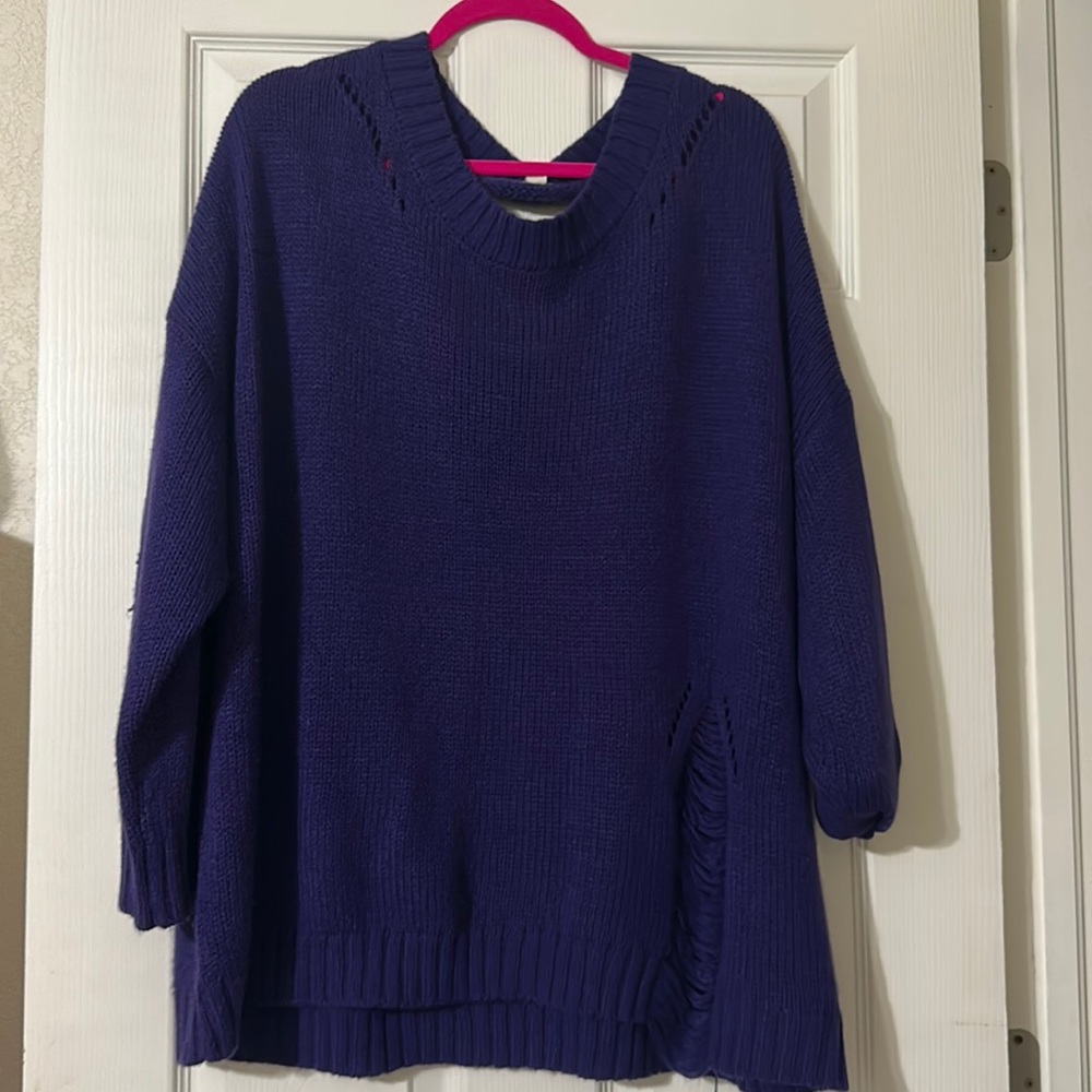 Ripped sweater